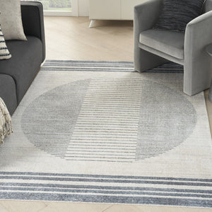 HomeRoots 7' Blue and Ivory Geometric Area Rug - Modern, Washable Design for Stylish Living Spaces and Comfort 7' X 9' 532863