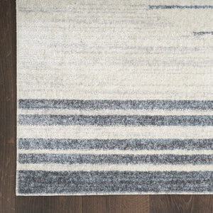 HomeRoots 7' Blue and Ivory Geometric Washable Area Rug - Modern Design for High-Traffic Spaces, Easy Care 7' X 9' 532864