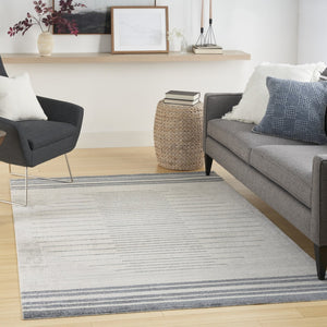HomeRoots 7' Blue and Ivory Geometric Washable Area Rug - Modern Design for High-Traffic Spaces, Easy Care 7' X 9' 532864