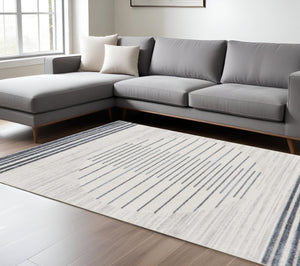 HomeRoots 7' Blue and Ivory Geometric Washable Area Rug - Modern Design for High-Traffic Spaces, Easy Care 7' X 9' 532864