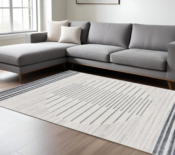 HomeRoots 7' Blue and Ivory Geometric Washable Area Rug - Modern Design for High-Traffic Spaces, Easy Care 7' X 9' 532864