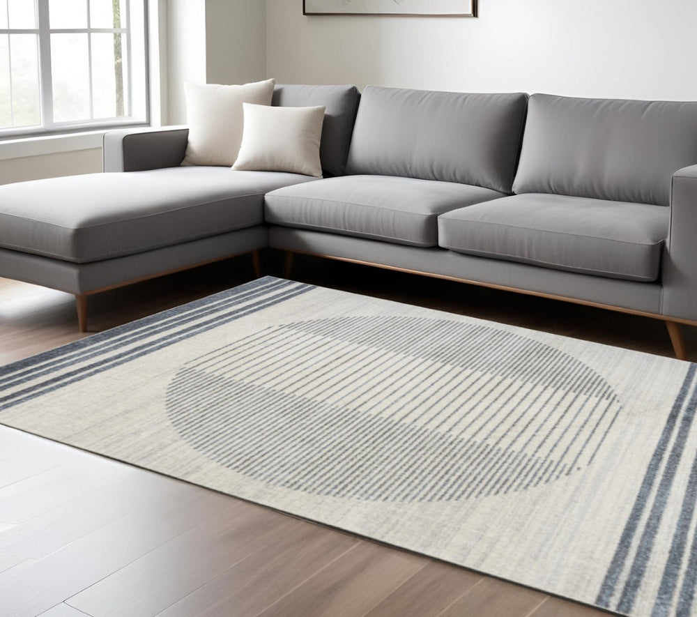HomeRoots 7' Blue and Ivory Geometric Area Rug - Modern, Washable Design for Stylish Living Spaces and Comfort 8' X 10' 532871