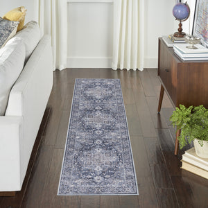 Homeroots 10' Blue And Ivory Floral Power Loom Distressed Washable Runner Rug  Cotton Blend 533083