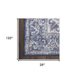 Homeroots 10' Blue And Ivory Floral Power Loom Distressed Washable Runner Rug  Cotton Blend 533087