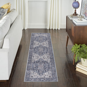 Homeroots 10' Blue And Ivory Floral Power Loom Distressed Washable Runner Rug  Cotton Blend 533087