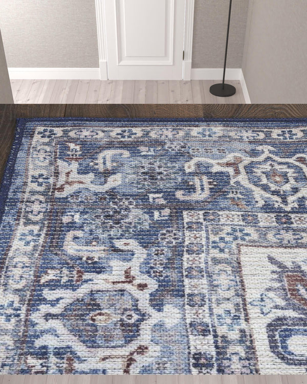 Homeroots 10' Blue And Ivory Floral Power Loom Distressed Washable Runner Rug  Cotton Blend 533087