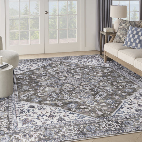 HomeRoots 9' X 12' Floral Power Loom Distressed Washable Area Rug for Timeless Elegance in Any Room Green, Ivory 533127