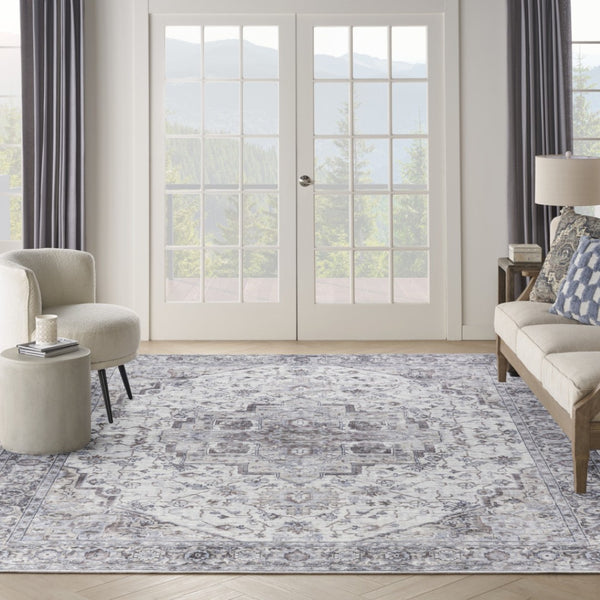 HomeRoots 9' X 12' Floral Power Loomed Area Rug - Distressed Washable Design for Elegant, Easy Care Living Spaces Beige, Ivory 533131