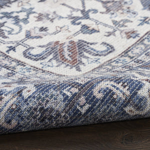 HomeRoots 9' X 12' Floral Power Loom Distressed Washable Area Rug for Timeless Elegance in Any Room Blue, Ivory 533133