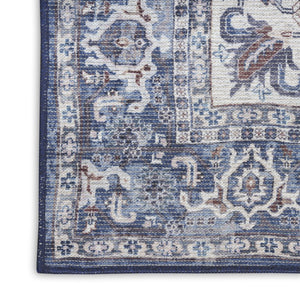 HomeRoots 9' X 12' Floral Power Loom Distressed Washable Area Rug for Timeless Elegance in Any Room Blue, Ivory 533133