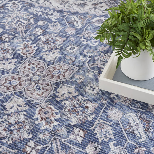 HomeRoots 9' X 12' Floral Power Loom Distressed Washable Area Rug for Timeless Elegance in Any Room Blue, Ivory 533133