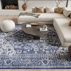 HomeRoots 9' X 12' Floral Power Loom Distressed Washable Area Rug for Timeless Elegance in Any Room Blue, Ivory 533133