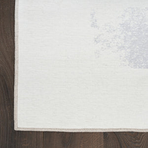 HomeRoots 8' Ivory and Blue Abstract Area Rug - Stylish, Washable, Non-Skid Design for Modern Living Spaces 8' X 10' 533183