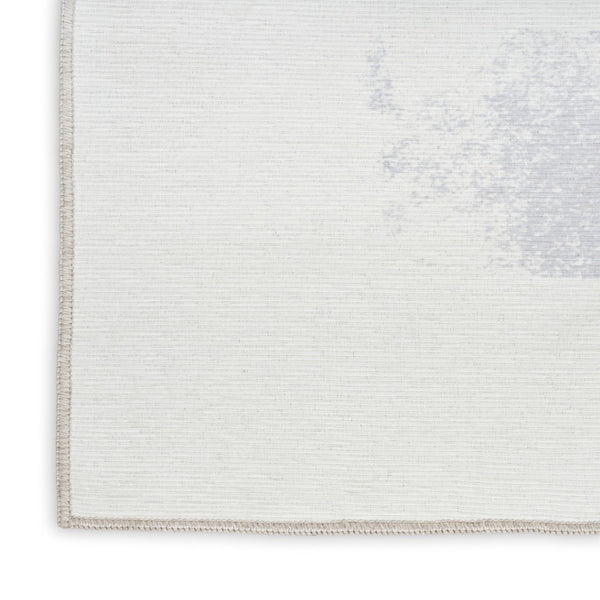 HomeRoots 8' Ivory and Blue Abstract Area Rug - Stylish, Washable, Non-Skid Design for Modern Living Spaces 8' X 10' 533183