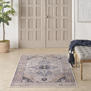 Homeroots 4' X 6' Ivory And Blue Oriental Power Loom Distressed Washable Non Skid Area Rug  Polyester 533291