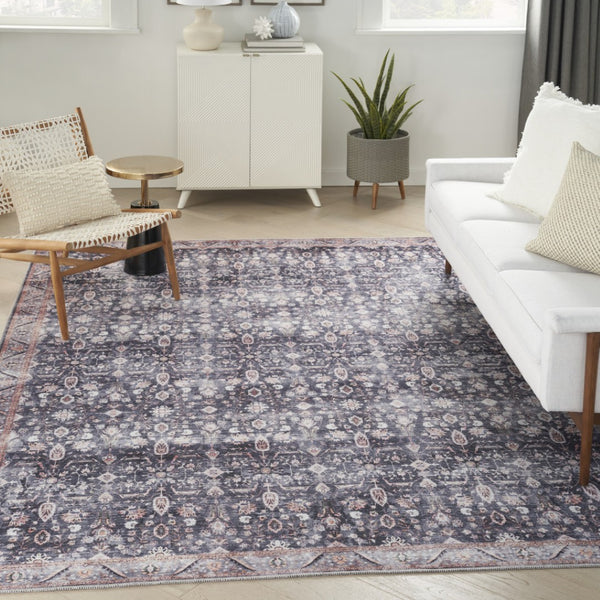 HomeRoots 5' Blue and Ivory Oriental Area Rug - Vintage-Inspired, Distressed Design, Washable, Non-Skid Style 5' X 8' 533306