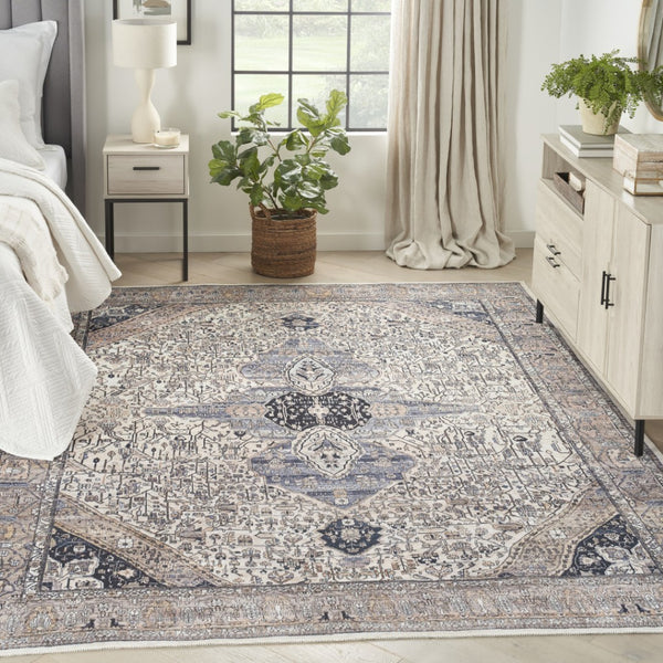 HomeRoots 5' Ivory and Blue Oriental Area Rug - Power Loomed, Distressed, Washable, Non-Skid for Easy Care 8' X 10' 533330