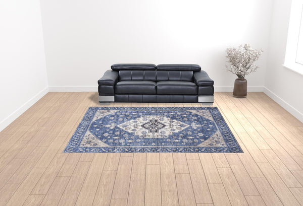 Homeroots 9' X 12' Blue And Ivory Oriental Power Loom Distressed Washable Non Skid Area Rug  Polyester 533338