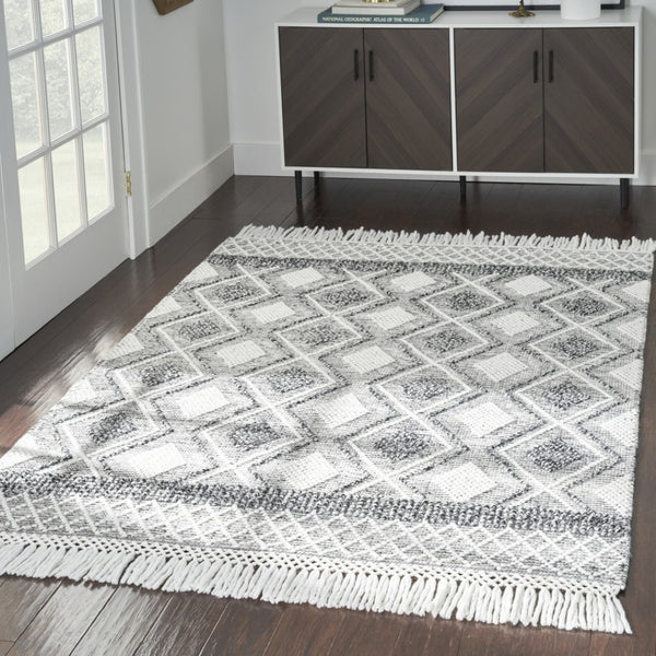 HomeRoots 5' Teal Ivory and Gray Floral Medallion Handmade Area Rug with Fringe - Elevate Your Space Elegantly 5' X 8' 533372