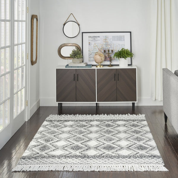 HomeRoots 5' Teal Ivory and Gray Floral Medallion Handmade Area Rug with Fringe - Elevate Your Space Elegantly 5' X 8' 533372