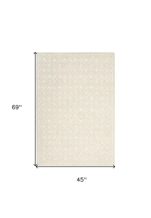 Homeroots 4' X 6' Ivory And Tan Geometric Hand Tufted Area Rug  Wool Blend 533379