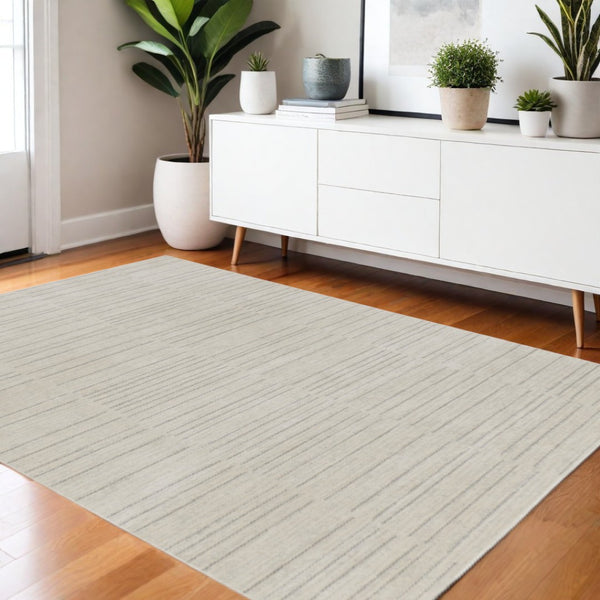 HomeRoots 4' Gray and Ivory Abstract Area Rug - Modern Scandinavian Design for Effortless Elegance and Comfort 4' X 6' 533393