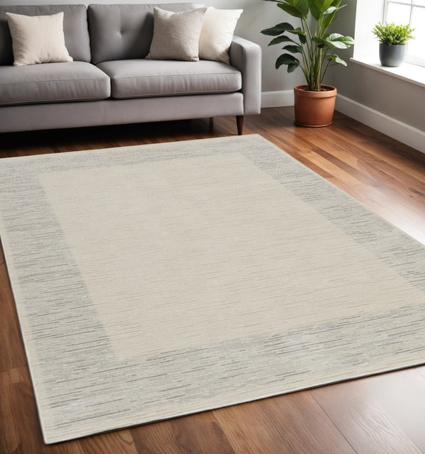 HomeRoots 4' Gray and Ivory Striped Area Rug - Modern Scandinavian Design for Entryways, Bedrooms, and More 5' X 7' 533399