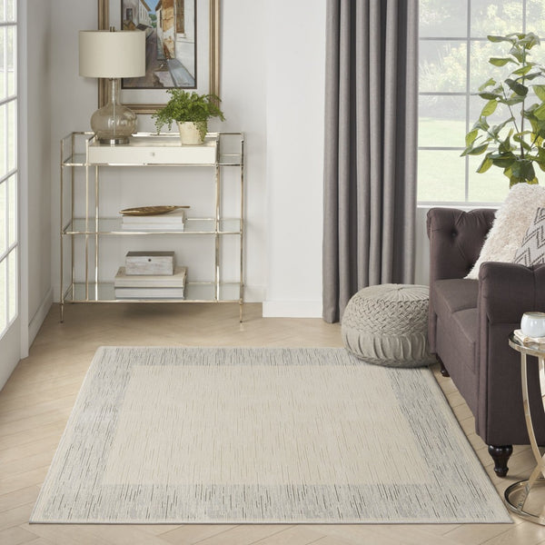 HomeRoots 4' Gray and Ivory Striped Area Rug - Modern Scandinavian Design for Entryways, Bedrooms, and More 5' X 7' 533399