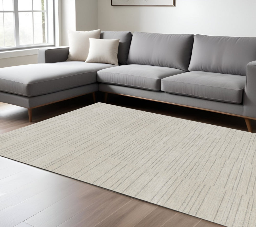 HomeRoots 4' Gray and Ivory Abstract Area Rug - Modern Scandinavian Design for Effortless Elegance and Comfort 6' X 9' 533407