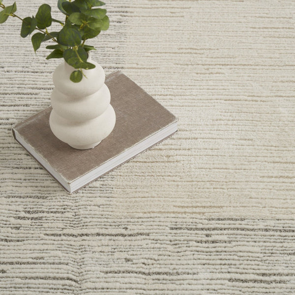 HomeRoots 8' X 10' Ivory and Gray Abstract Power Loom Area Rug - Modern Elegance for Living Spaces & Style 533413