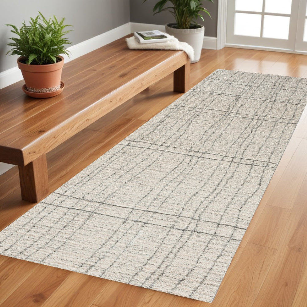 HomeRoots 8' Gray and Ivory Abstract Runner Rug - Stylish, Durable Design for High-Traffic Hallways and Entryways 533422