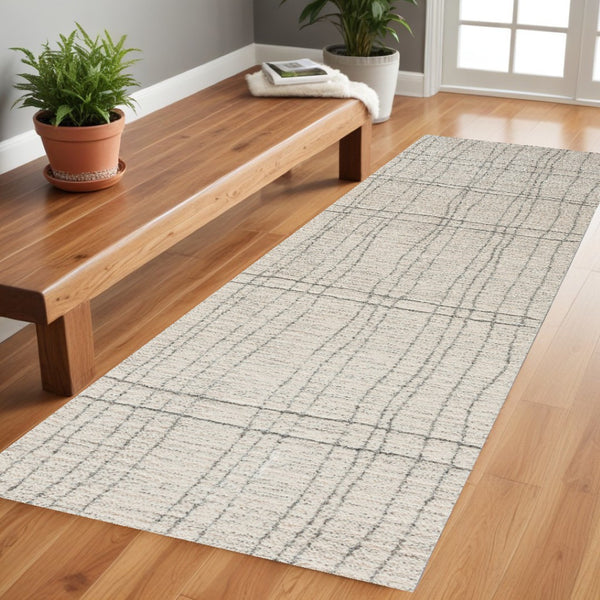HomeRoots 8' Gray and Ivory Abstract Runner Rug - Stylish, Durable Design for High-Traffic Hallways and Entryways 533422