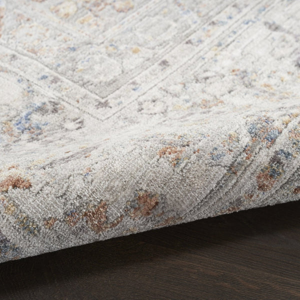 HomeRoots 8' X 10' Elegant Ivory and Blue Oriental Area Rug - Power Loomed, Distressed with Fringe Design 533436