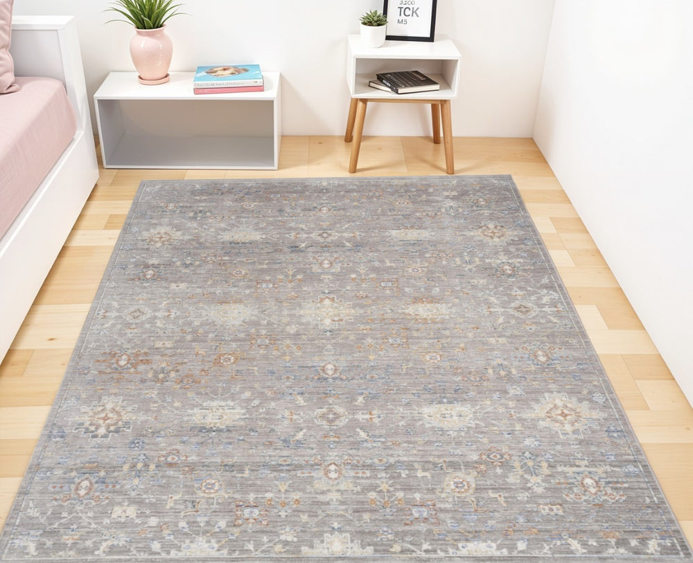 HomeRoots 8' X 10' Distressed Oriental Power Loom Area Rug with Fringe for Vintage-Inspired Home Decor Ivory, Blue, Gray 533438