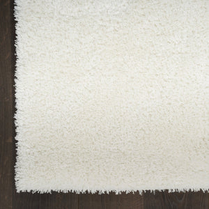 HomeRoots 5' Luxurious Ivory Shag Area Rug - Soft, Cozy, and Stylish Addition for Modern Living Spaces 5' X 7' 533571