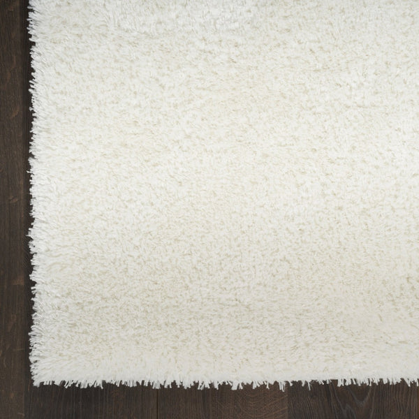 HomeRoots 5' Luxurious Ivory Shag Area Rug - Soft, Cozy, and Stylish Addition for Modern Living Spaces 5' X 7' 533571
