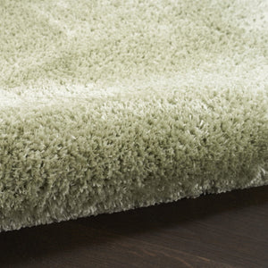 HomeRoots 5' Lush Green Shag Area Rug – Retro-Inspired Comfort for Cozy Living Spaces and Stylish Accents 5' X 7' 533572