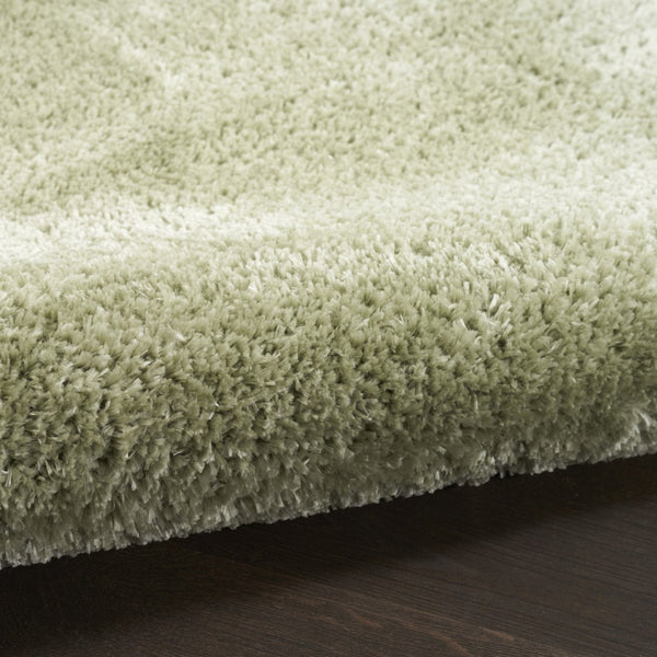 HomeRoots 5' Lush Green Shag Area Rug – Retro-Inspired Comfort for Cozy Living Spaces and Stylish Accents 5' X 7' 533572