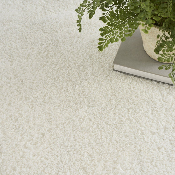 HomeRoots 5' Luxurious Ivory Shag Area Rug - Soft, Cozy, and Stylish Addition for Modern Living Spaces 8' X 10' 533575