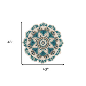 Homeroots 4' Blue Round Wool Floral Hand Tufted Area Rug Ivory Wool 533605