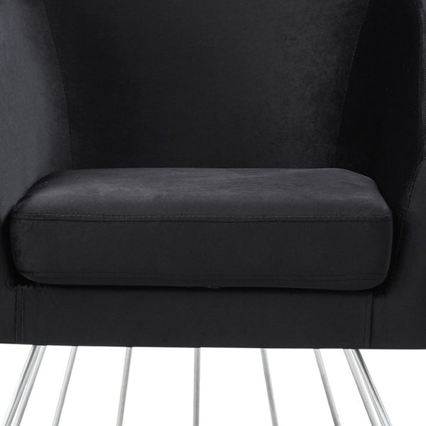 HomeRoots 29" Black and Silver Velvet Barrel Chair - Plush Comfort Meets Modern Elegance for Any Space 533849