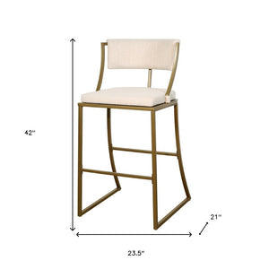 HomeRoots 30" Beige Low Back Bar Chair with Antiqued Brass Frame - Vintage Charm for Modern Spaces 534318