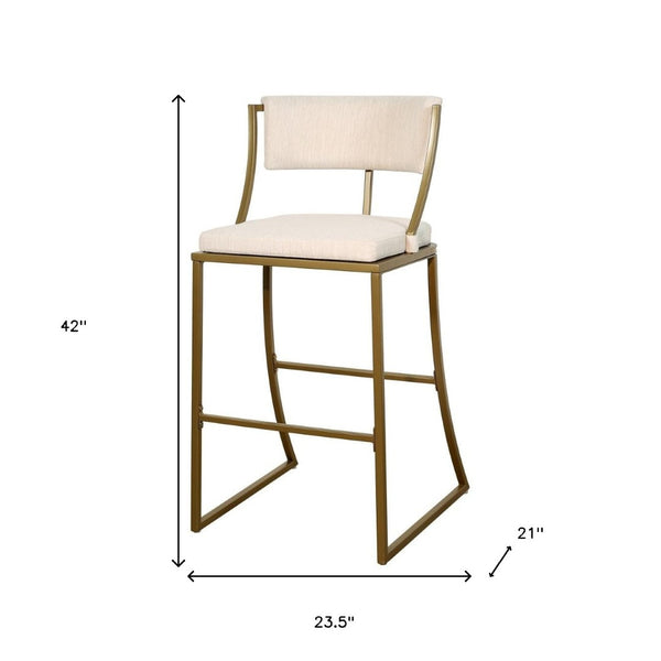 HomeRoots 30" Beige Low Back Bar Chair with Antiqued Brass Frame - Vintage Charm for Modern Spaces 534318