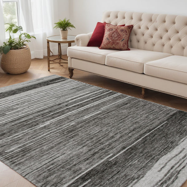 Homeroots 5' X 8' Gray And Black Abstract Power Loom Distressed Non Skid Area Rug  Polyester 534394