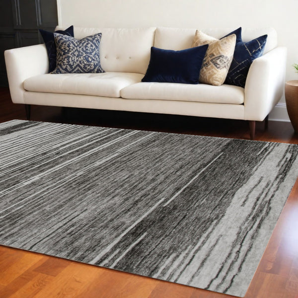 Homeroots 8' X 11' Gray And Black Abstract Power Loom Distressed Non Skid Area Rug  Polyester 534396