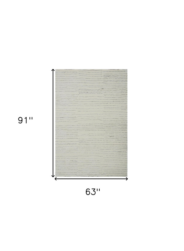 Homeroots 5' X 8' Beige And Gray Abstract Power Loom Distressed Non Skid Area Rug  Polyester 534397