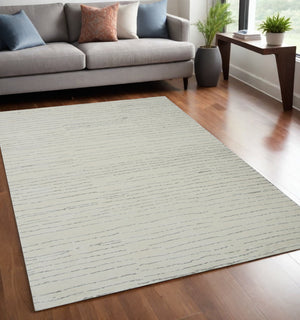 Homeroots 5' X 8' Beige And Gray Abstract Power Loom Distressed Non Skid Area Rug  Polyester 534397