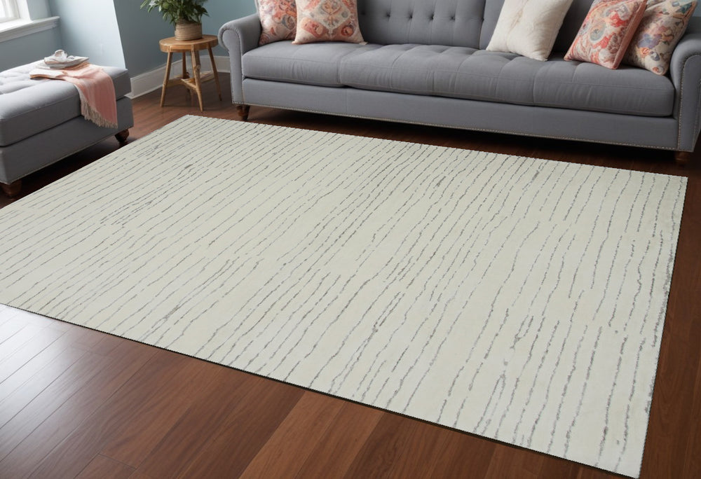 Homeroots 8' X 11' Beige And Gray Abstract Power Loom Distressed Area Rug  Polyester 534399
