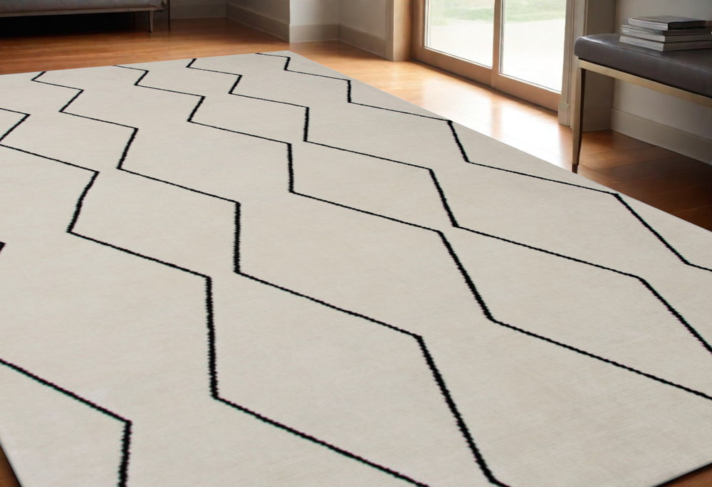 Homeroots 5' X 8' Beige And Black Geometric Power Loom Distressed Non Skid Area Rug  Polyester 534403