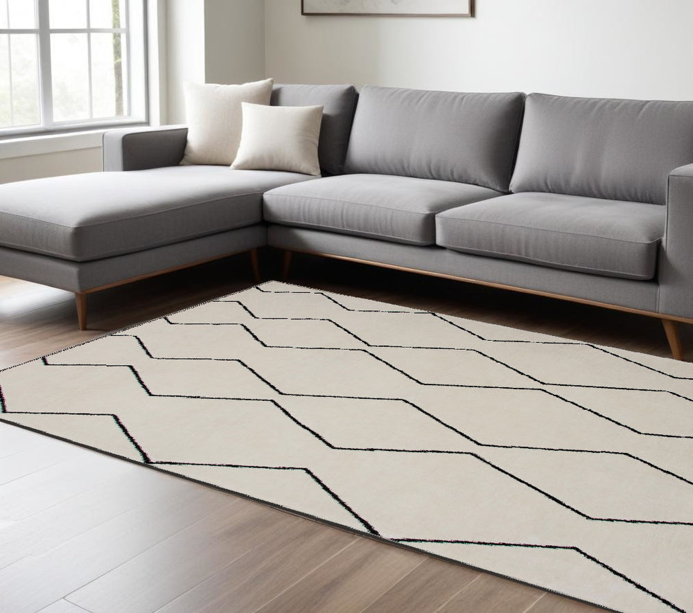 Homeroots 7' X 10' Beige And Black Geometric Power Loom Distressed Non Skid Area Rug  Polyester 534404